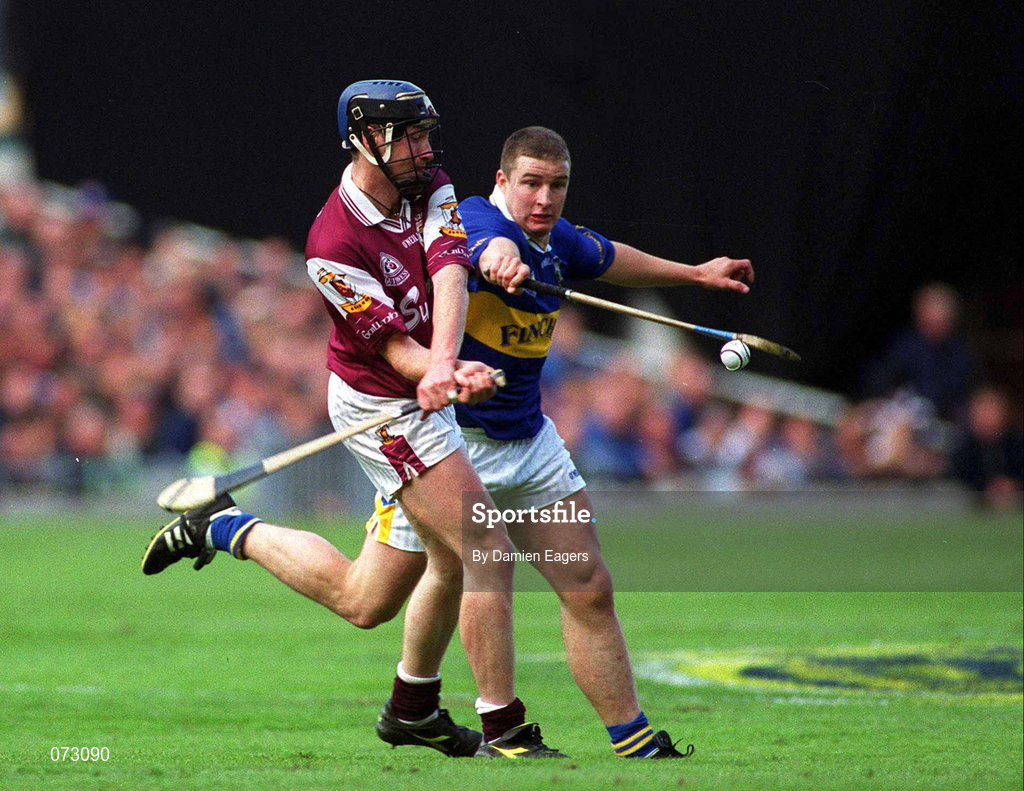 9 September 2001; Liam Hodgins of Galway in action against John Carroll of Tipperary during the Guinness All-Ireland Senior Hurling Championship Final match between Tipperary and Galway at Croke Park in Dublin. Photo by Damien Eagers/Sportsfile