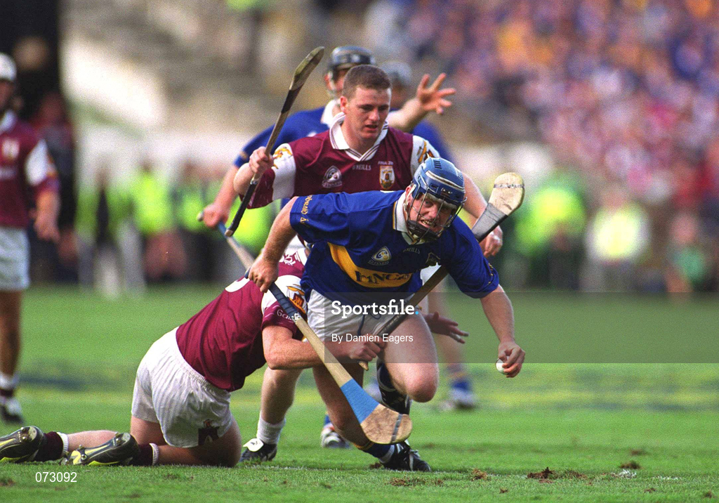 9 September 2001; Eugene O'Neill of Tipperary is tackled by Liam Hodgins, left, and Gregory Kennedy of Galway during the Guinness All-Ireland Senior Hurling Championship Final match between Tipperary and Galway at Croke Park in Dublin. Photo by Damien Eagers/Sportsfile