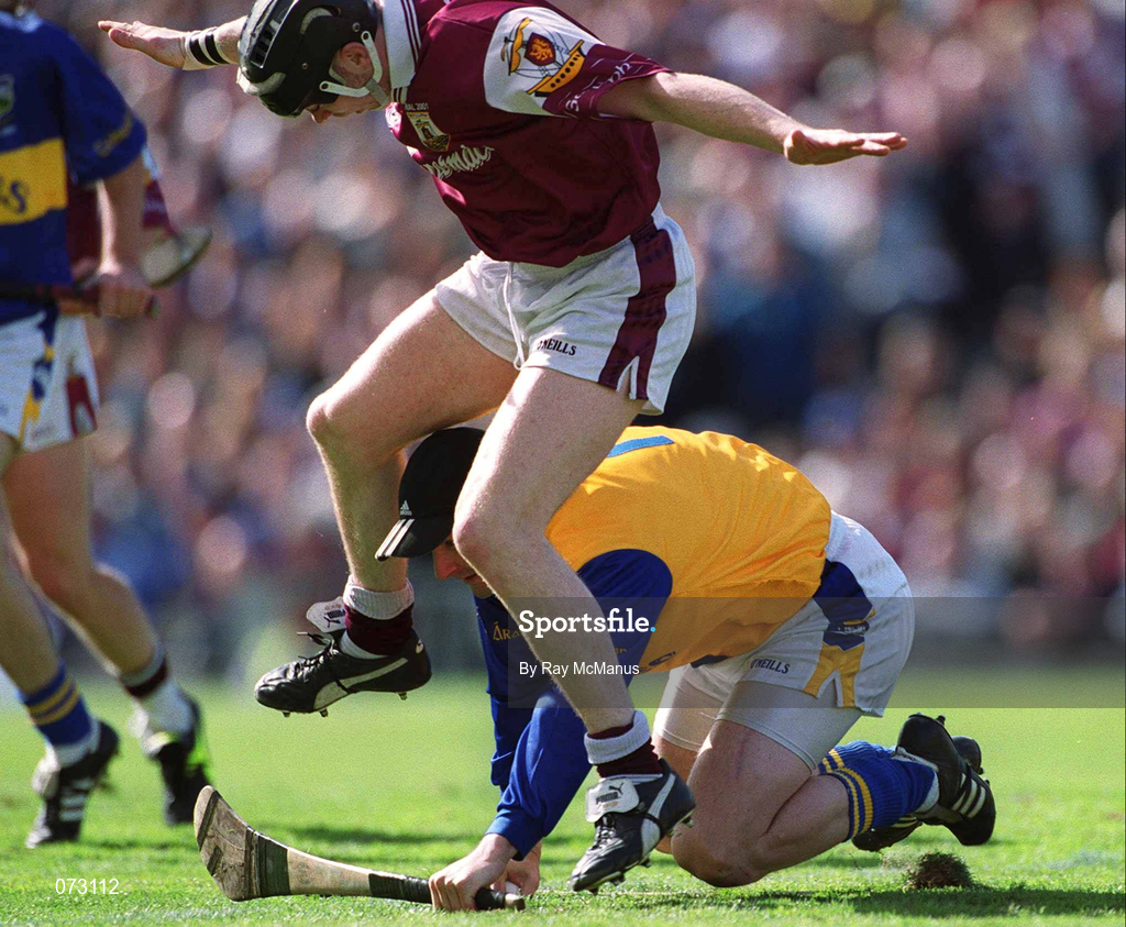 9 September 2001; Tipperary goalkeeper Brendan Cummins grabs the sliothar under pressure from Eugene Cloonan of Galway during the Guinness All-Ireland Senior Hurling Championship Final match between Tipperary and Galway at Croke Park in Dublin. Photo by Ray McManus/Sportsfile