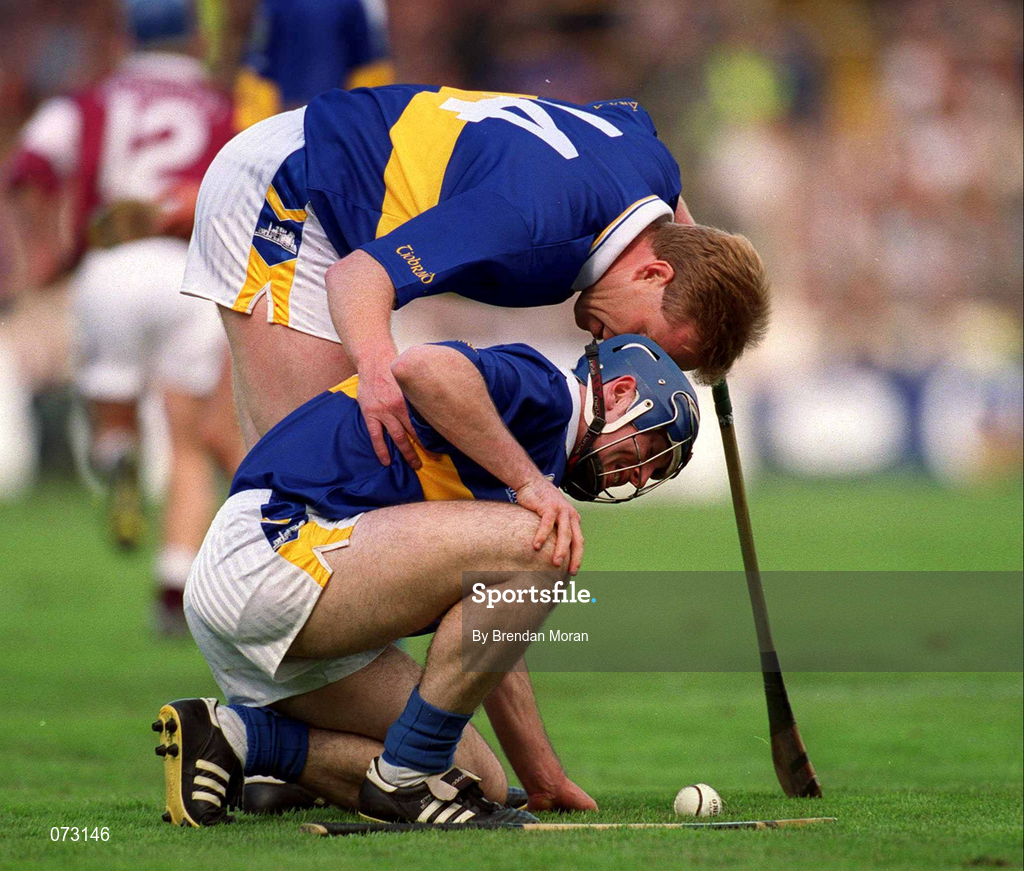 9 September 2001; Tipperary's Declan Ryan has an encouraging word with team-mate Eoin Kelly following the Guinness All-Ireland Senior Hurling Championship Final match between Tipperary and Galway at Croke Park in Dublin. Photo by Brendan Moran/Sportsfile