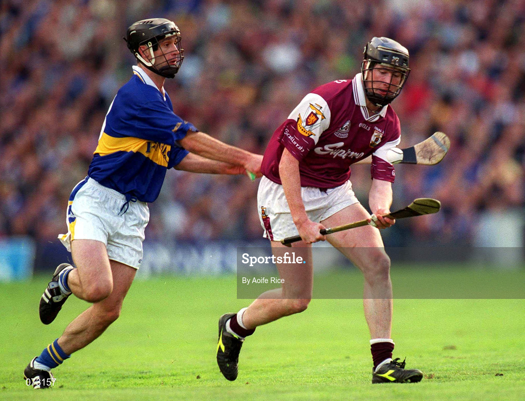 9 September 2001; Liam Hodgins of Galway in action against Thomas Dunne of Tipperary during the Guinness All-Ireland Senior Hurling Championship Final match between Tipperary and Galway at Croke Park in Dublin. Photo by Aoife Rice/Sportsfile