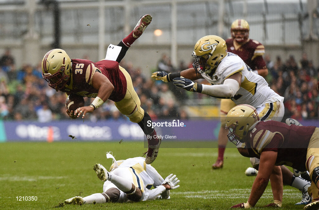 3 September 2016; Boston College running back Tyler Rouse is tackled by Step Durham of Georgia Tech during the Aer Lingus College Football Classic match between Boston College Eagles and Georgia Tech Yellow Jackets at the Aviva Stadium in Lansdowne Road, Dublin. Photo by Cody Glenn/Sportsfile