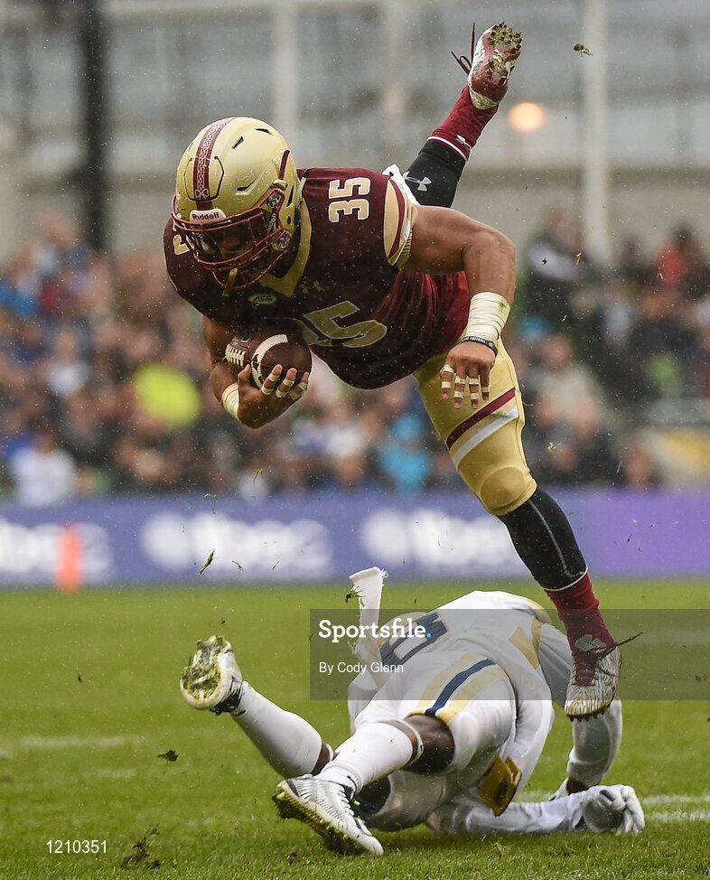 3 September 2016; Boston College running back Tyler Rouse is tackled by Step Durham of Georgia Tech during the Aer Lingus College Football Classic match between Boston College Eagles and Georgia Tech Yellow Jackets at the Aviva Stadium in Lansdowne Road, Dublin. Photo by Cody Glenn/Sportsfile