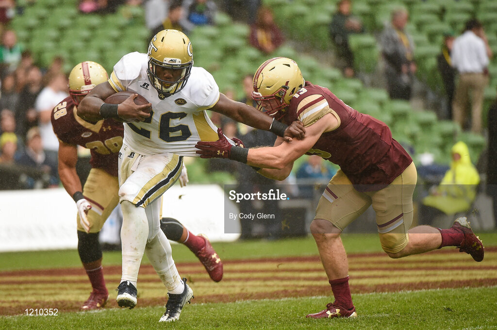 3 September 2016; Georgia Tech running back Dedrick Mills is tackled by Anthony Brown of  Boston College during the Aer Lingus College Football Classic match between Boston College Eagles and Georgia Tech Yellow Jackets at the Aviva Stadium in Lansdowne Road, Dublin. Photo by Cody Glenn/Sportsfile