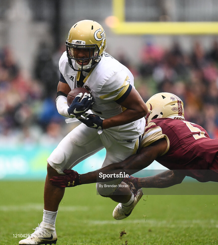3 September 2016; Wide Receiver Ricky Jeune of Georgia Tech Yellow Jackets is tackled by Defensive Back Kamrin Moore of Boston College Eagles during the Aer Lingus College Football Classic match between Boston College Eagles and Georgia Tech Yellow Jackets at the Aviva Stadium in Lansdowne Road, Dublin. Photo by Brendan Moran/Sportsfile