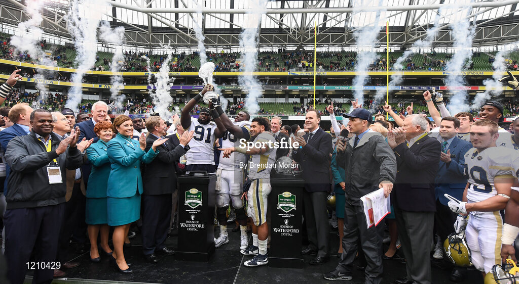 3 September 2016; Defensive Lineman Patrick Gamble (C) and Offensive Lineman Freddie Burden of Georgia Tech Yellow Jackets lift the trophy after the Aer Lingus College Football Classic match between Boston College Eagles and Georgia Tech Yellow Jackets at the Aviva Stadium in Lansdowne Road, Dublin. Photo by Brendan Moran/Sportsfile