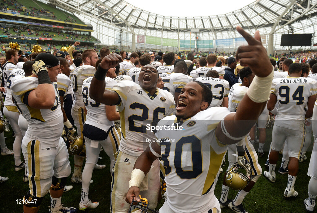 3 September 2016; Georgia Tech team-mates KirVonte Benson (30) and Dedrick Mills celebrate winning the Aer Lingus College Football Classic match between Boston College Eagles and Georgia Tech Yellow Jackets at the Aviva Stadium in Lansdowne Road, Dublin. Photo by Cody Glenn/Sportsfile