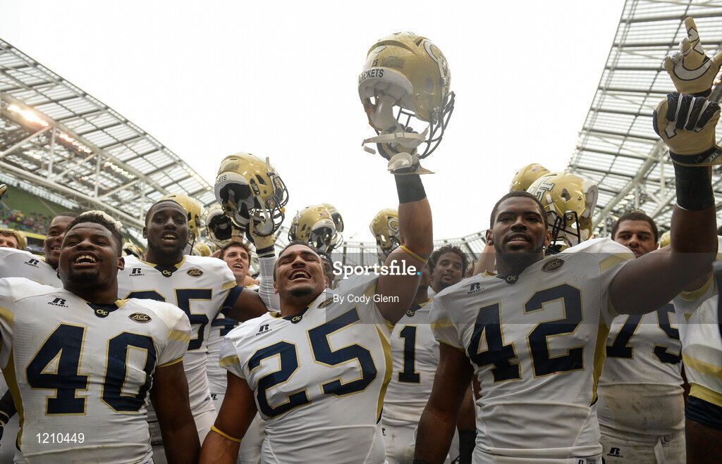 3 September 2016; Georgia Tech players including, from left, P.J. Davis, Tre' Jackson, and KeShun Freeman celebrate winning the Aer Lingus College Football Classic match between Boston College Eagles and Georgia Tech Yellow Jackets at the Aviva Stadium in Lansdowne Road, Dublin. Photo by Cody Glenn/Sportsfile