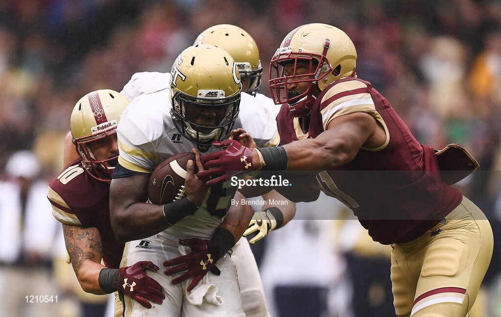 3 September 2016; Dedrick Mills of Georgia Tech Yellow Jackets is tackled by Linebacker Ty Schwab, left, and Defensive End Wyatt Ray of Boston College Eagles during the Aer Lingus College Football Classic match between Boston College Eagles and Georgia Tech Yellow Jackets at the Aviva Stadium in Lansdowne Road, Dublin. Photo by Brendan Moran/Sportsfile