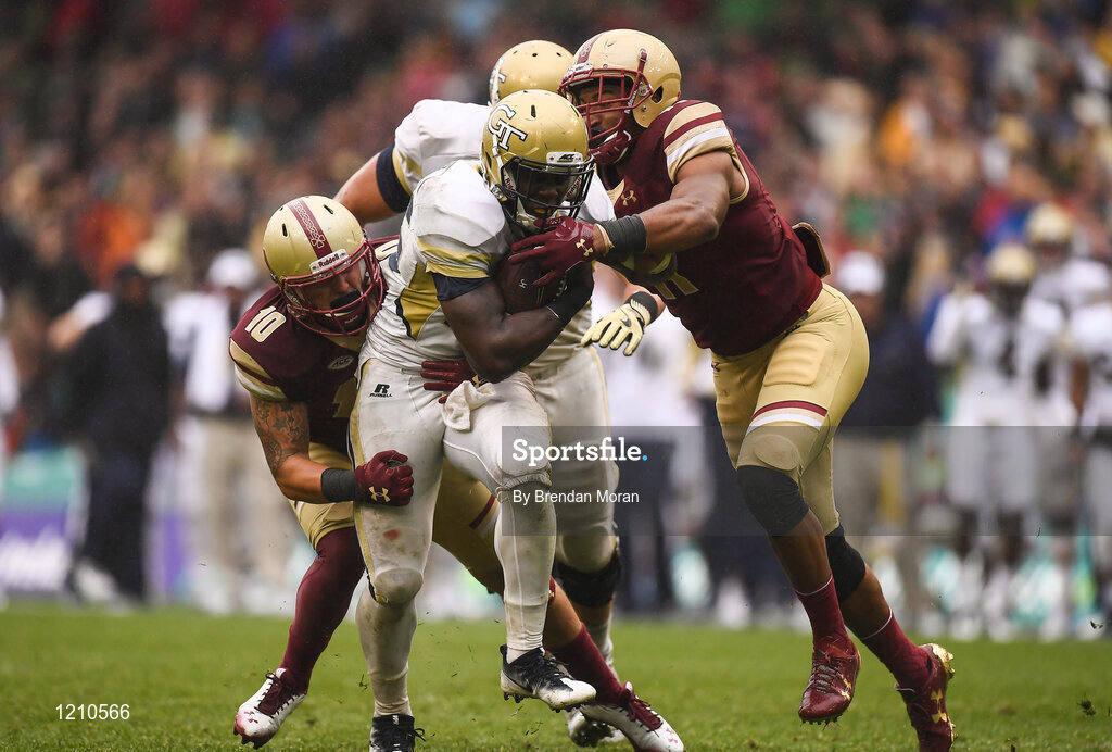 3 September 2016; Dedrick Mills of Georgia Tech Yellow Jackets  is tackled by Linebacker Ty Schwab, left, and Defensive End Wyatt Ray of Boston College Eagles during the Aer Lingus College Football Classic match between Boston College Eagles and Georgia Tech Yellow Jackets at the Aviva Stadium in Lansdowne Road, Dublin. Photo by Brendan Moran/Sportsfile