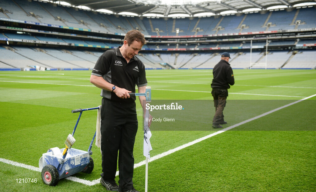 4 September 2016; Pitch manager Stuart Wilson installs flags along the sidelines ahead of the GAA Hurling All-Ireland Senior Championship Final match between Kilkenny and Tipperary at Croke Park in Dublin. Photo by Cody Glenn/Sportsfile