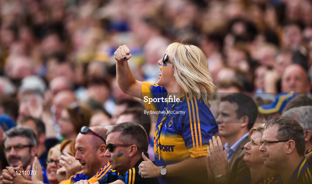 4 September 2016; A Tipperary supporter celebrates a score during the GAA Hurling All-Ireland Senior Championship Final match between Kilkenny and Tipperary at Croke Park in Dublin. Photo by Stephen McCarthy/Sportsfile
