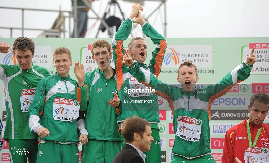 12 December 2010; The Ireland U23 men's team, from left, John Coghlan, David Rooney, Michale Mulhare, David McCarthy and Brendan O'Neill step onto the podium to receive their team gold medals. 17th SPAR European Cross Country Championships, Albufeira, Portugal. Picture credit: Brendan Moran / SPORTSFILE