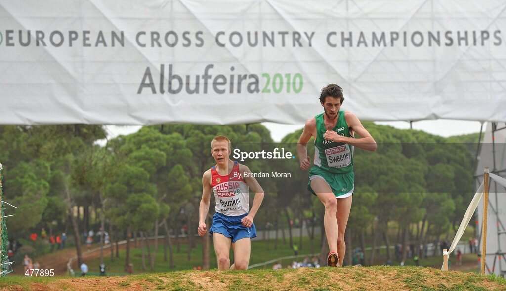 12 December 2010; Ireland's Joe Sweeney competes against Aleksey Reunkov of Russia, on his way to finishing 21st in the Men's Senior race with a time of 29:51. 17th SPAR European Cross Country Championships, Albufeira, Portugal. Picture credit: Brendan Moran / SPORTSFILE