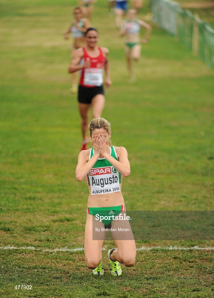 12 December 2010; Portugal's Jessica Augusto falls to her knees after winning the Senior Women's race with a time of 26:52. 17th SPAR European Cross Country Championships, Albufeira, Portugal. Picture credit: Brendan Moran / SPORTSFILE