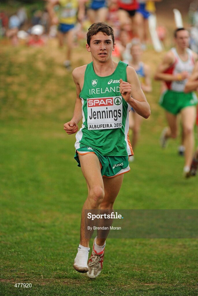 12 December 2010; Ireland's Emmet Jennings runs along with one running shoe on his way to finishing in 42nd place in the Men's Junior race with at time of 19:07. 17th SPAR European Cross Country Championships, Albufeira, Portugal. Picture credit: Brendan Moran / SPORTSFILE