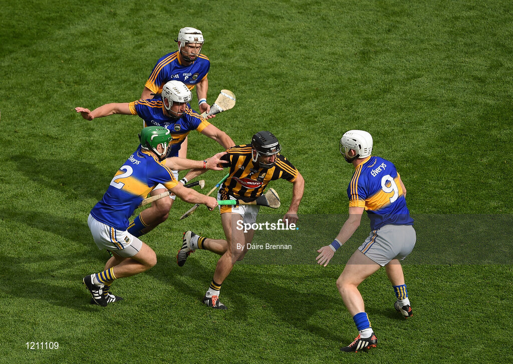 4 September 2016; Conor Fogarty of Kilkenny in action against Tipperary players, left to right, Cathal Barrett, Patrick Maher, Brendan Maher, and Michael Breen, during the GAA Hurling All-Ireland Senior Championship Final match between Kilkenny and Tipperary at Croke Park in Dublin. Photo by Daire Brennan/Sportsfile