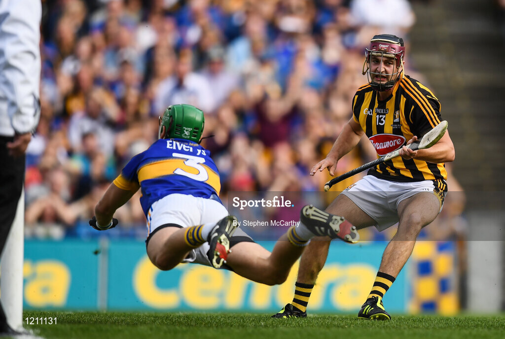4 September 2016; Kevin Kelly of Kilkenny after scoring his side's first goal despite the attempts of James Barry of Tipperary during the GAA Hurling All-Ireland Senior Championship Final match between Kilkenny and Tipperary at Croke Park in Dublin. Photo by Stephen McCarthy/Sportsfile
