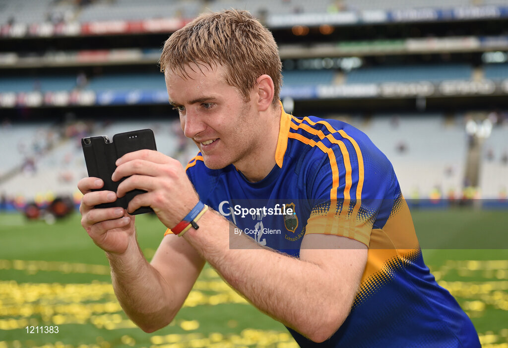4 September 2016; Noel McGrath of Tipperary takes a picture of team-mates celebrating following the GAA Hurling All-Ireland Senior Championship Final match between Kilkenny and Tipperary at Croke Park in Dublin. Photo by Cody Glenn/Sportsfile