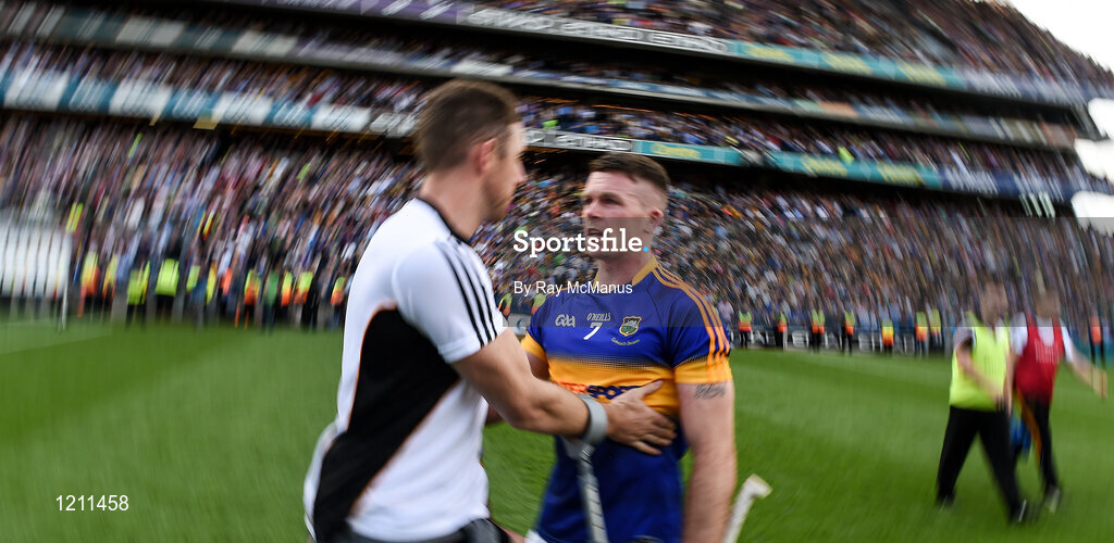 4 September 2016; Michael Fennelly of Kilkenny, who did not line out because of an injury, congratulates Pádraic Maher of Tipperary after the GAA Hurling All-Ireland Senior Championship Final match between Kilkenny and Tipperary at Croke Park in Dublin. Photo by Ray McManus/Sportsfile