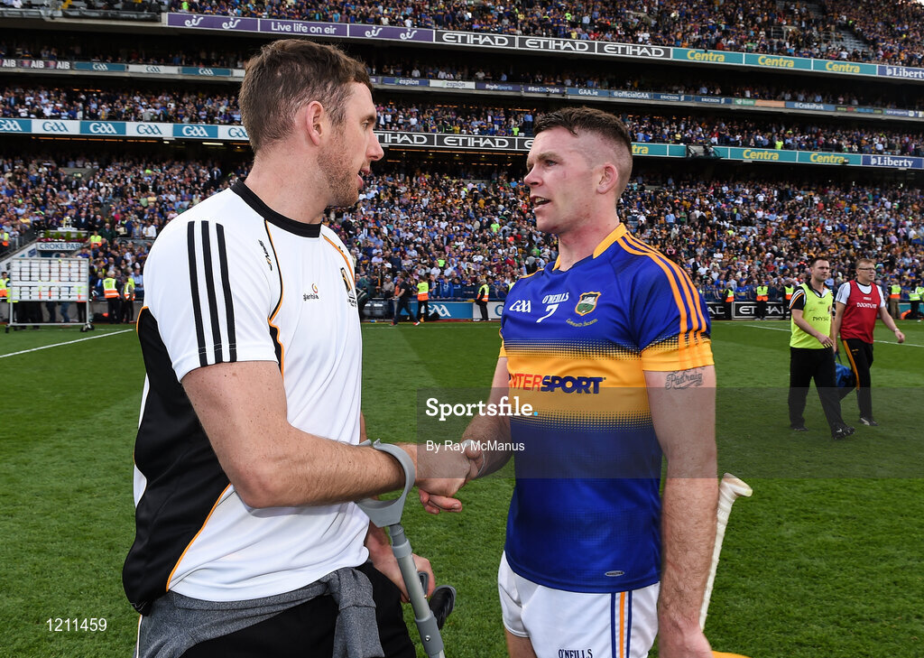 4 September 2016; Michael Fennelly of Kilkenny, who did not line out because of an injury, congratulates Pádraic Maher of Tipperary after the GAA Hurling All-Ireland Senior Championship Final match between Kilkenny and Tipperary at Croke Park in Dublin. Photo by Ray McManus/Sportsfile