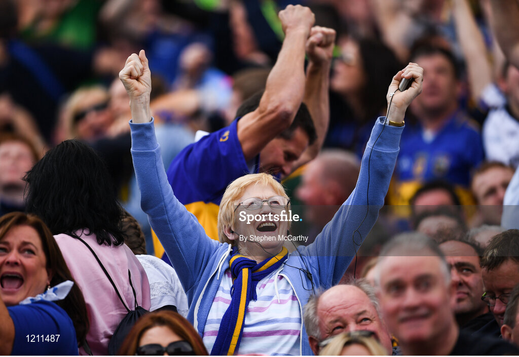4 September 2016; A Tipperary supporter celebrates during the GAA Hurling All-Ireland Senior Championship Final match between Kilkenny and Tipperary at Croke Park in Dublin. Photo by Stephen McCarthy/Sportsfile