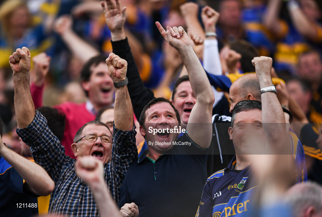 4 September 2016; Tipperary supporters celebrate during the GAA Hurling All-Ireland Senior Championship Final match between Kilkenny and Tipperary at Croke Park in Dublin. Photo by Stephen McCarthy/Sportsfile