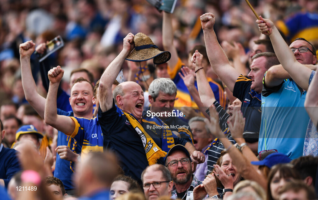 4 September 2016; Tipperary supporters celebrate during the GAA Hurling All-Ireland Senior Championship Final match between Kilkenny and Tipperary at Croke Park in Dublin. Photo by Stephen McCarthy/Sportsfile