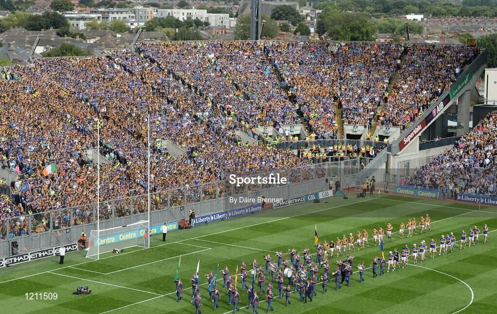 4 September 2016; The Kilkenny and Tipperary teams parade behind the Artane School of Music Band ahead of the GAA Hurling All-Ireland Senior Championship Final match between Kilkenny and Tipperary at Croke Park in Dublin. Photo by Daire Brennan/Sportsfile
