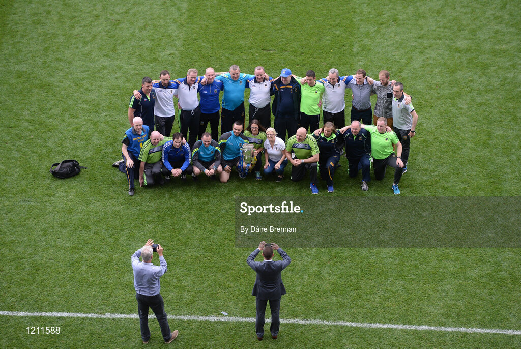 4 September 2016; The Tipperary backroom team, including manager Michael Ryan, have their photo taken with the Liam MacCarthy cup after the GAA Hurling All-Ireland Senior Championship Final match between Kilkenny and Tipperary at Croke Park in Dublin. Photo by Daire Brennan/Sportsfile