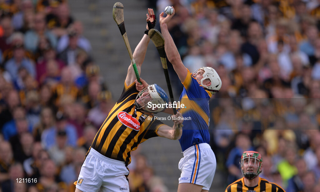 4 September 2016; Ronan Maher of Tipperary in action against TJ Reid of Kilkenny, supported by team-mate Eóin Larkin, right, during the GAA Hurling All-Ireland Senior Championship Final match between Kilkenny and Tipperary at Croke Park in Dublin. Photo by Piaras Ó Mídheach/Sportsfile