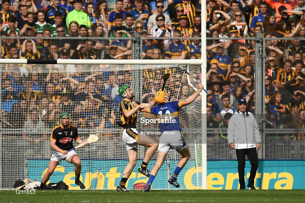 4 September 2016; Séamus Callanan of Tipperary gains possession ahead of Joey Holden of Kilkenny before shooting on goal during the GAA Hurling All-Ireland Senior Championship Final match between Kilkenny and Tipperary at Croke Park in Dublin. Photo by Brendan Moran/Sportsfile