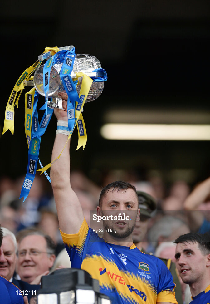 4 September 2016; James Barry of Tipperary lifts the trophy following his team's victory in the GAA Hurling All-Ireland Senior Championship Final match between Kilkenny and Tipperary at Croke Park in Dublin. Photo by Seb Daly/Sportsfile