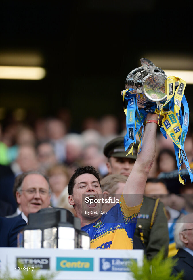 4 September 2016; John O’Dwyer of Tipperary lifts the trophy following his team's victory in the GAA Hurling All-Ireland Senior Championship Final match between Kilkenny and Tipperary at Croke Park in Dublin. Photo by Seb Daly/Sportsfile
