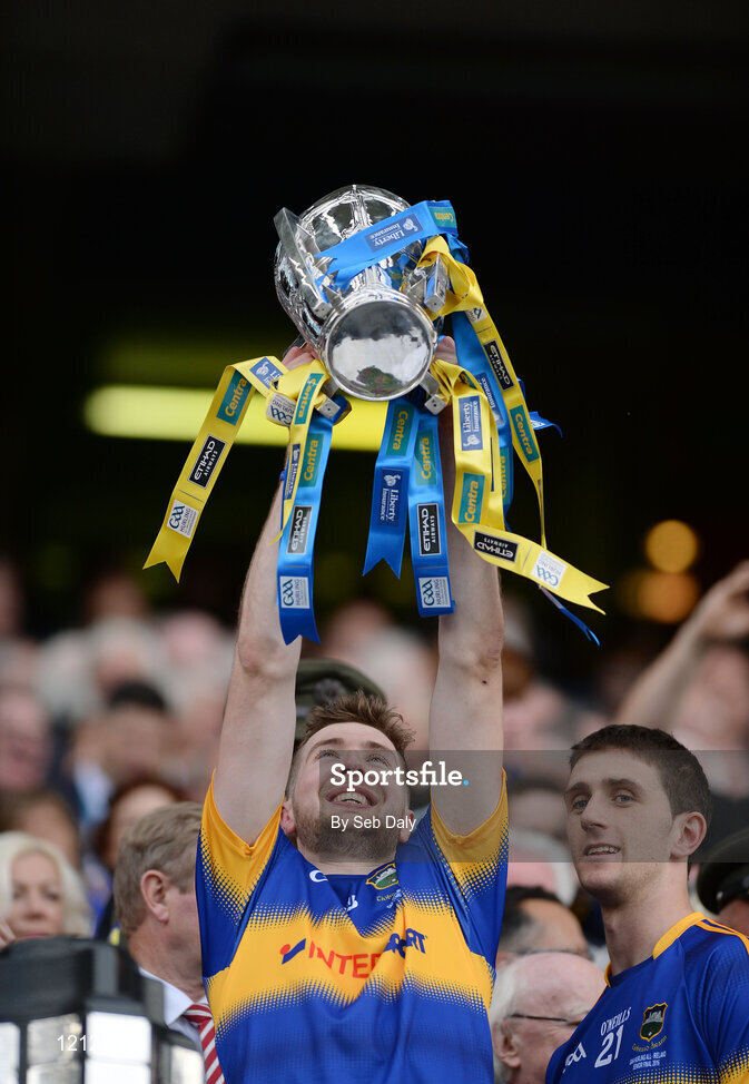 4 September 2016; Tomás Hamill of Tipperary lifts the trophy following his team's victory in the GAA Hurling All-Ireland Senior Championship Final match between Kilkenny and Tipperary at Croke Park in Dublin. Photo by Seb Daly/Sportsfile