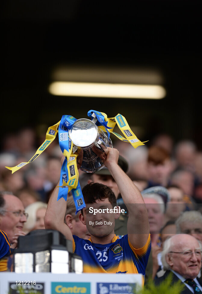 4 September 2016; Niall O’Meara of Tipperary lifts the trophy following his team's victory in the GAA Hurling All-Ireland Senior Championship Final match between Kilkenny and Tipperary at Croke Park in Dublin. Photo by Seb Daly/Sportsfile