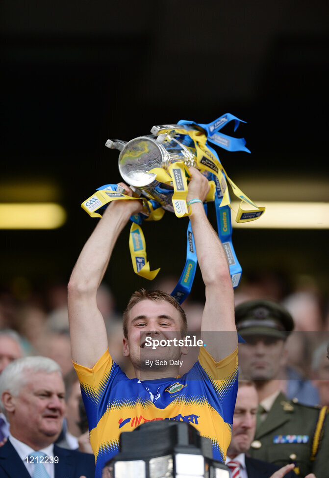 4 September 2016; John McGrath of Tipperary lifts the trophy following his team's victory in the GAA Hurling All-Ireland Senior Championship Final match between Kilkenny and Tipperary at Croke Park in Dublin. Photo by Seb Daly/Sportsfile