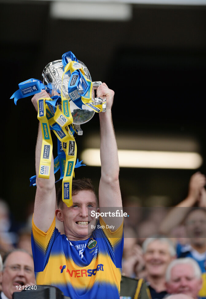 4 September 2016; Séamus Kennedy of Tipperary lifts the trophy following his team's victory in the GAA Hurling All-Ireland Senior Championship Final match between Kilkenny and Tipperary at Croke Park in Dublin. Photo by Seb Daly/Sportsfile