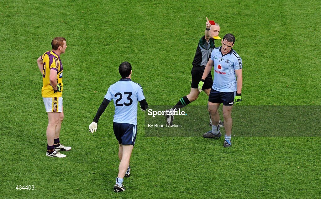 13 June 2010; Dublin's Gerard Brennan is shown the red card by referee Martin Higgins. Leinster GAA Football Senior Championship Quarter-Final, Dublin v Wexford, Croke Park, Dublin. Picture credit: Brian Lawless / SPORTSFILE