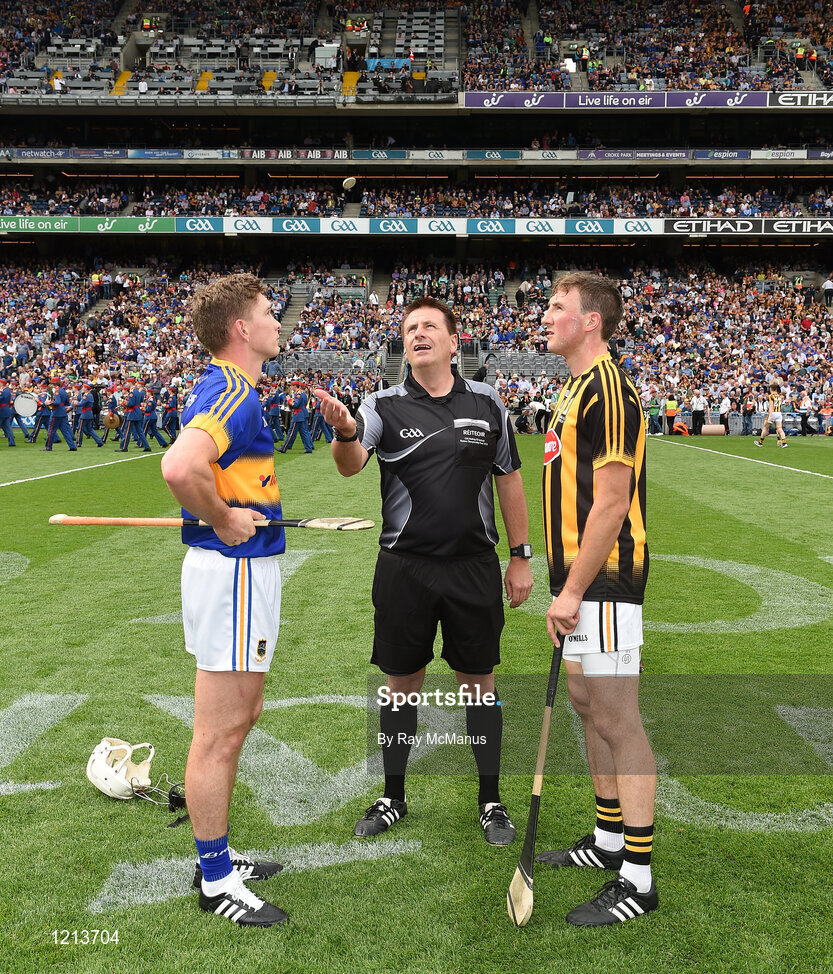 4 September 2016; Tipperary captain Brendan Maher and Kilkenny captain Shane Prendergast look on as referee Brian Gavin tosses a commemorative Michael Collins coin before the GAA Hurling All-Ireland Senior Championship Final match between Kilkenny and Tipperary at Croke Park in Dublin. Photo by Ray McManus/Sportsfile