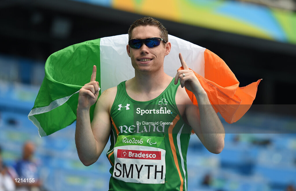 9 September 2016; Jason Smyth of Ireland celebrates with the Ireland flag after winning the Men's 100m T13 Final, with a time of 10.64, at the Rio Olympic Stadium during the Rio 2016 Paralympic Games in Rio de Janeiro, Brazil. Photo by Diarmuid Greene/Sportsfile