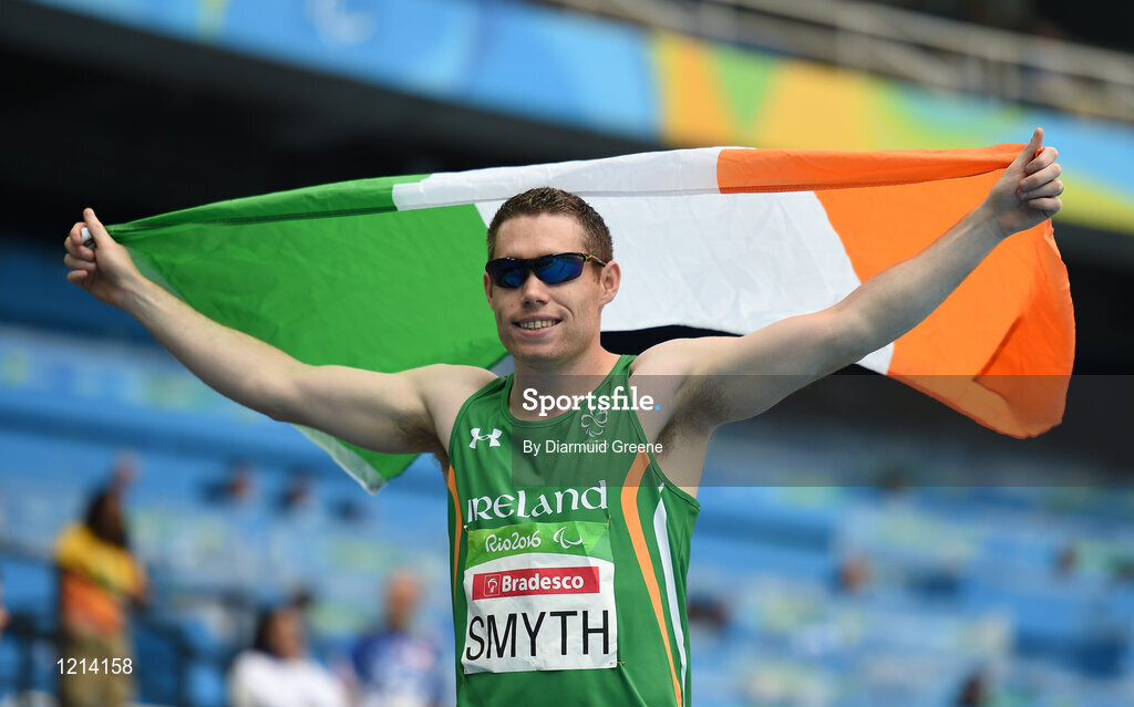 9 September 2016; Jason Smyth of Ireland celebrates with the Ireland flag after winning the Men's 100m T13 Final, with a time of 10.64, at the Rio Olympic Stadium during the Rio 2016 Paralympic Games in Rio de Janeiro, Brazil. Photo by Diarmuid Greene/Sportsfile