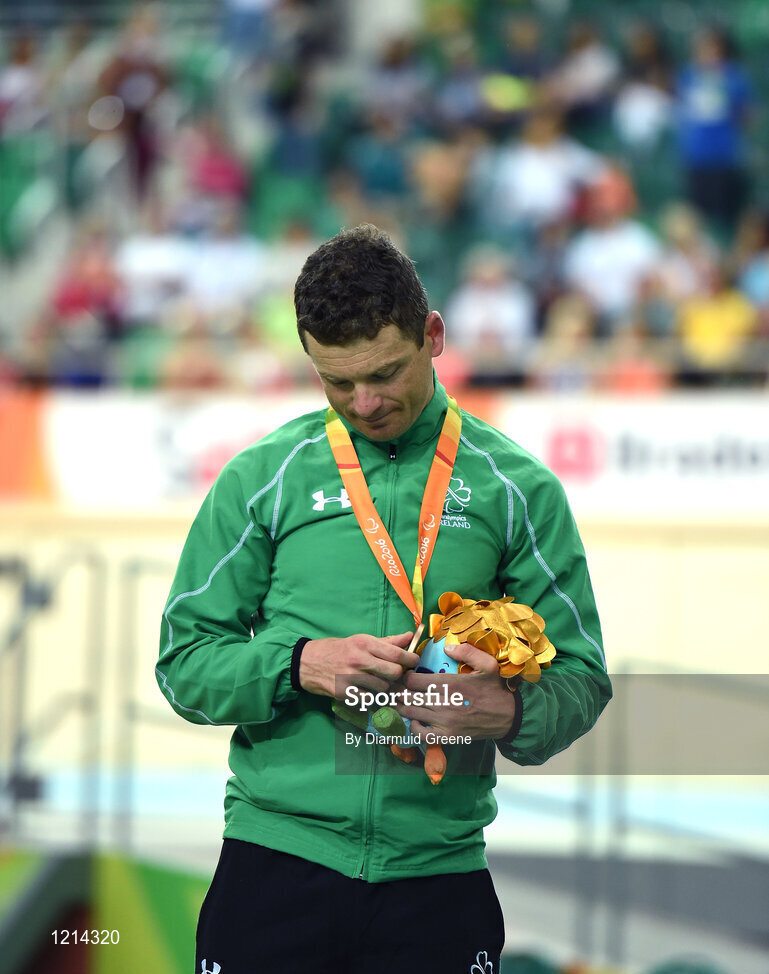 9 September 2016; Eoghan Clifford of Ireland looks at his bronze medal during the presentation after finishing third in the Men's C3 3000m Individual Pursuit Final at the Rio Olympic Velodrome during the Rio 2016 Paralympic Games in Rio de Janeiro, Brazil. Photo by Diarmuid Greene/Sportsfile