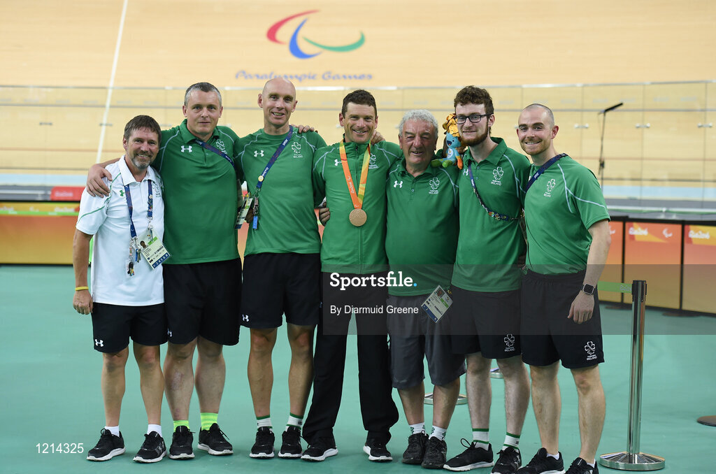 9 September 2016; Bronze medallist Eoghan Clifford of Ireland after the Men's C3 3000m Individual Pursuit Final with members of his team, from left to right, Ireland Chef de Mission Denis Toomey, Cycling Team Manager Tommy McGowan, head coach Neill Delahaye, mechanic Gerry Beggs, mechanic Eóin Murphy, and physiotherapist Johnny Loughrey, at the Rio Olympic Velodrome during the Rio 2016 Paralympic Games in Rio de Janeiro, Brazil. Photo by Diarmuid Greene/Sportsfile