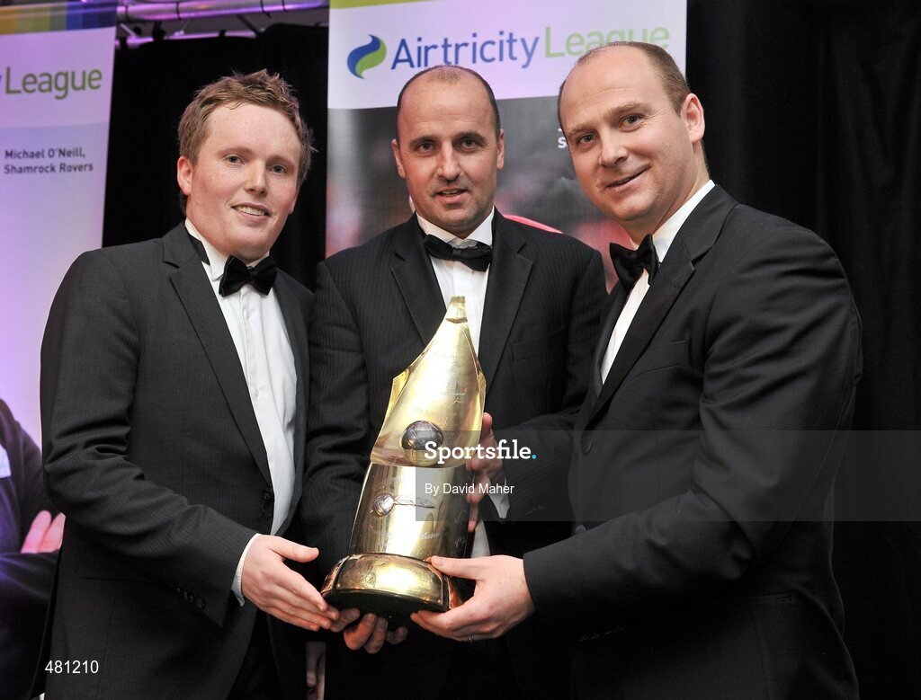 14 January 2010; Sligo Rovers manager Paul Cook, centre, with his Airtricity SWAI Personailty of the Year Award for 2010, with Stephen Wheeler, right, Managing Director, Airtricity, and Daniel McDonnell, President, Soccer Writers Association of Ireland. The Airtricity SWAI Awards 2010, The Conrad Hotel, Dublin. Picture credit: David Maher / SPORTSFILE