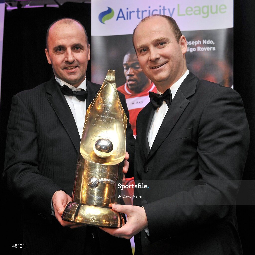 14 January 2010; Sligo Rovers manager Paul Cook, left, with his Airtricity SWAI Personailty of the Year Award for 2010 and Stephen Wheeler, Managing Director, Airtricity. The Airtricity SWAI Awards 2010, The Conrad Hotel, Dublin. Picture credit: David Maher / SPORTSFILE