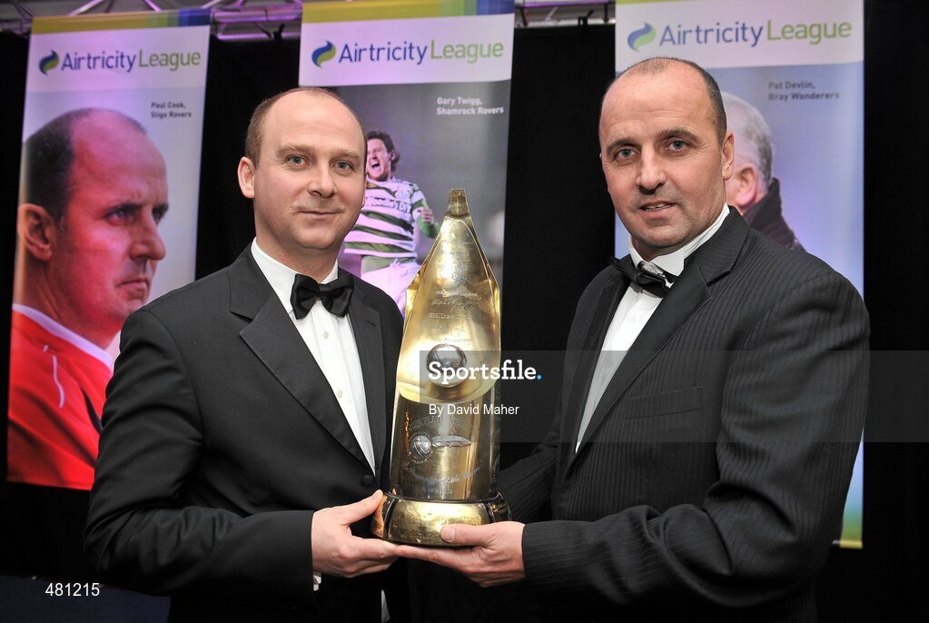 14 January 2010; Sligo Rovers manager Paul Cook, right, with his Airtricity SWAI Personailty of the Year Award for 2010, and Stephen Wheeler, Managing Director, Airtricity. The Airtricity SWAI Awards 2010, The Conrad Hotel, Dublin. Picture credit: David Maher / SPORTSFILE