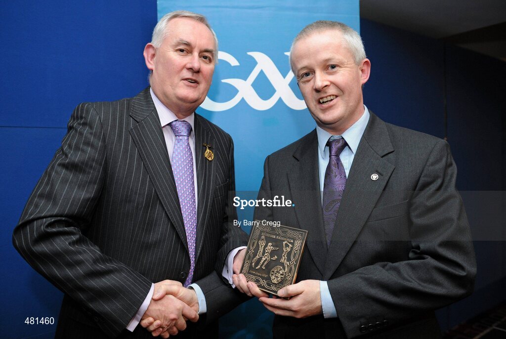15 January 2011; Retiring referee Tomás Quigley, from Co. Dublin, is presented with his referee's award by Uachtarán CLG Criostóir Ó Cuana. 2010 National Referees' Awards Banquet, Croke Park, Dublin. Picture credit: Barry Cregg / SPORTSFILE