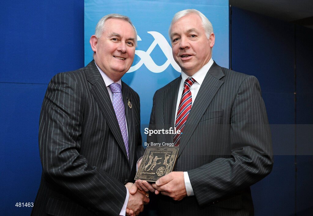15 January 2011; Retiring referee Fergus Devereux, from Co. Kildare, is presented with his referee's award by Uachtarán CLG Criostóir Ó Cuana. 2010 National Referees' Awards Banquet, Croke Park, Dublin. Picture credit: Barry Cregg / SPORTSFILE