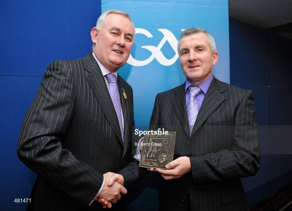 15 January 2011; Retiring referee Jimmy McKee, from Co. Armagh, is presented with his referee's award by Uachtarán CLG Criostóir Ó Cuana. 2010 National Referees' Awards Banquet, Croke Park, Dublin. Picture credit: Barry Cregg / SPORTSFILE